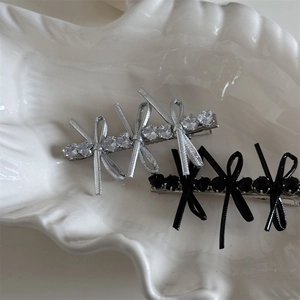 Elegant leather bow hair clips with heart zircon in silver and black metal finish
