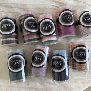 Bulk pack of 9 tubes with colorful high elasticity velvet hair ties for ponytail styling