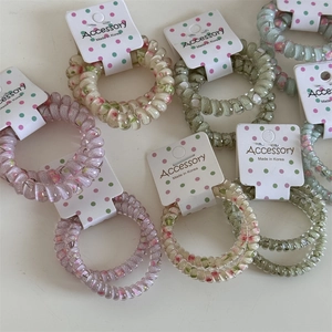 Pastel candy color polka dot phone cord hair ties set with floral patterns