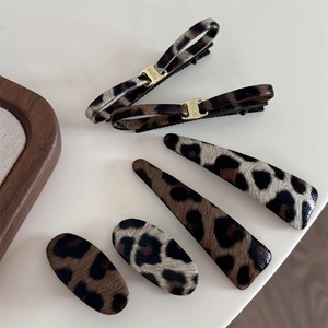 Retro leopard print leather bow hair clips set with gold metal duckbill slides