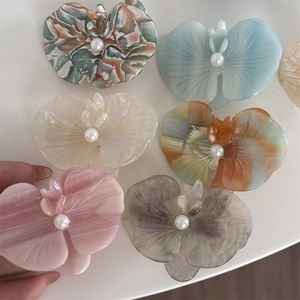 Floral acetate hair clips with pearl center in six colors for elegant styling