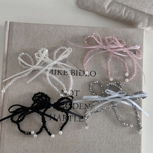 Set of four French beaded bow hair clips in white, pink, black and grey tones