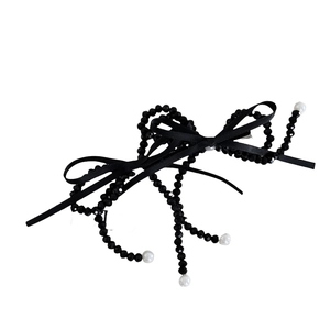 French style beaded bow hair clip with black faceted beads and elegant white pearls