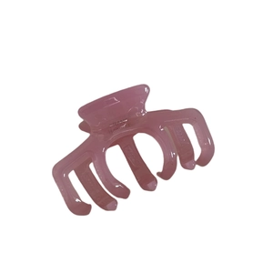 Pink translucent acetate jelly hair claw clip with elegant multi-tooth design for women