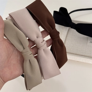 Eleganti cerchietti per capelli in tessuto con doppio fiocco in quattro colori