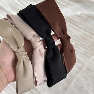 Cerchietti in raso con doppio fiocco in colori oro, rosa, nero e marrone raffinati