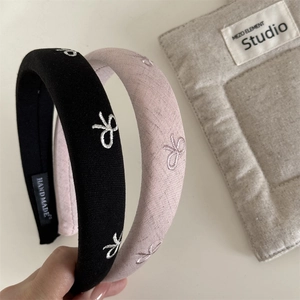 Padded embroidery bow headband set in black and pink for hair styling and volume