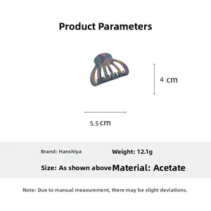 Detail view of acetate shell hair claw with dimensions 5.5cm by 4cm and weight 12.1g