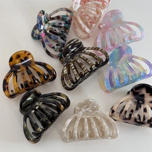 Hollow out shell pattern acetate shark hair clips in assorted marble and tortoise colors