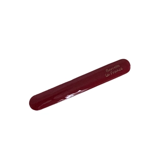 Elegant deep burgundy acetate hair clip with Barrette la France gold lettering label