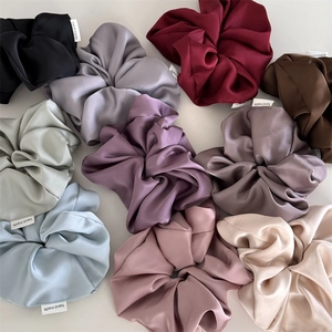 Premium oversized satin scrunchies set in ten elegant colors with silk gloss finish