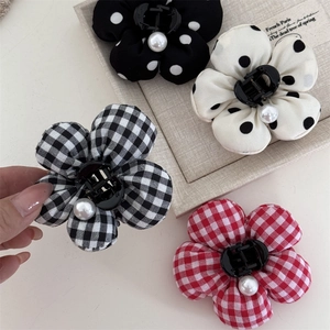 Floral fabric hair claws with polka dots, checkers and central pearl in four styles