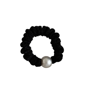Vintage elastic black scrunchie with single white pearl ornament and subtle shimmer fabric