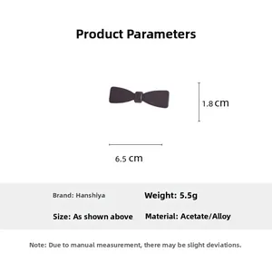 Détail de la barrette nœud en acétate montrant les dimensions 6,5 cm de long et 1,8 cm de haut