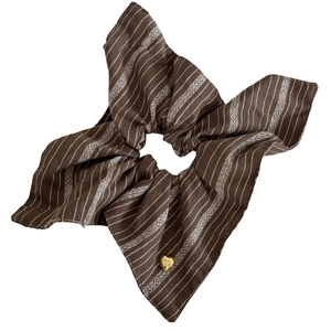 Retro brown striped hair scrunchie with golden heart charm and geometric pattern