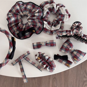 Classic red and blue plaid fabric hair accessory set with ribbons and metal charms