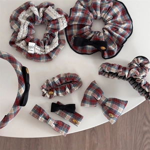 Red and green plaid hair accessory set with lace scrunchies and bow hairclips