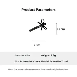 Détails du nœud à cheveux noir avec strass indiquant 6 cm de long et un poids de 3,8 g