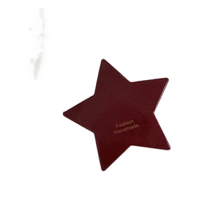 Handmade burgundy star hair clip for New Year featuring gold fashion lettering