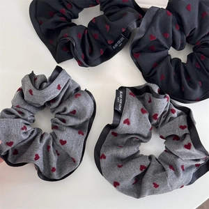 Elegant scrunchie set with heart pattern and black edge trim in black and grey