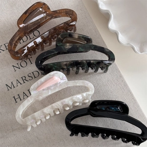 French style hollow acetate hair claws in tortoise shell and marble patterns for women