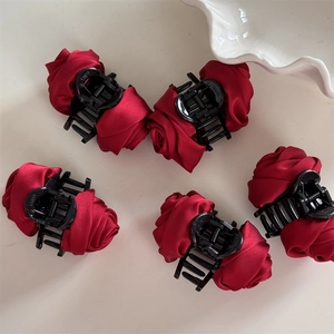 Five-piece set of elegant red satin rose hair claw clips with black plastic base