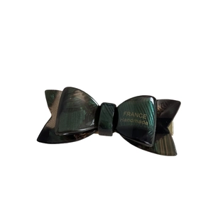 Elegant double-layered acetate bow hair clip with green marble pattern for women