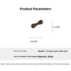 Detailed view of leopard print bow hair clip with size 4.6cm and alloy material specs