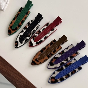 Set of six leopard print no-crease hair clips in various colors for makeup and styling