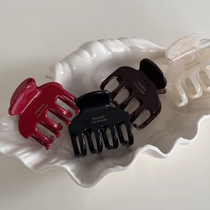 Elegant handmade acetate hair claw clips in four colors with premium gold labeling