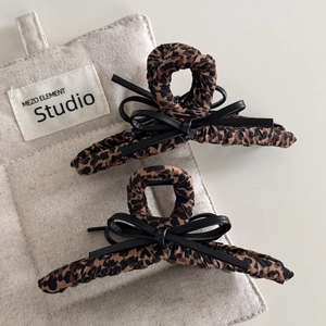 Vintage leopard print hair claw clips with black leather bows for autumn winter styles