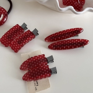 Chic red and white polka dot hair clip set with resin clips and matching hair tie