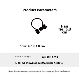 Dettaglio dell'elastico per capelli a fiocco in acetato marrone, misura 4,8x1,8cm e peso 6,9g