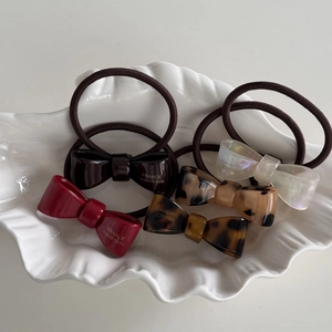 Set di 5 elastici per capelli a fiocco in acetato tartarugato e colori solidi con scritte
