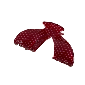 Minimalist deep red hair claw clip with white polka dots for versatile festive styling
