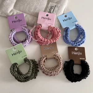 Set of six high-elasticity scrunchies in assorted pastel colors for daily hair styling