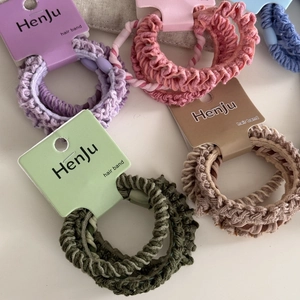 4-pack high elastic woven hair scrunchies in assorted pastel colors on card packaging