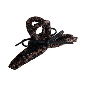 Leopard print hair claw clip with black leather bow tie accessory for women