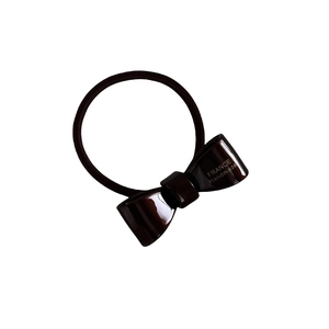 Elastico per capelli marrone in acetato con fiocco lucido e logo dorato fatto a mano