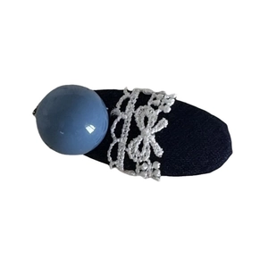Navy blue bead white lace bow hair clip minimalist design on white background