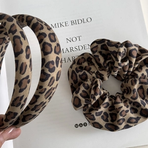 Chic leopard print headband and scrunchie set in soft fabric for stylish hair styling