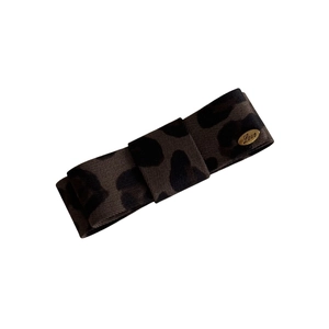 Vintage leopard print bow hair clip in dark brown fabric with a golden Love metal plate