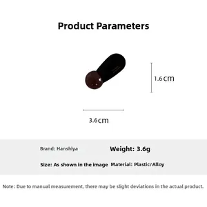 Detail showing dimensions of brown heart hair clip with France Handmade engraving