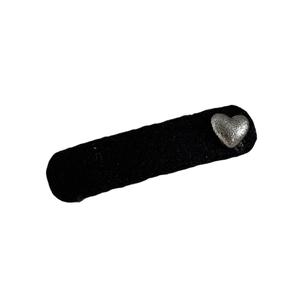Vintage black velvet hair clip with a textured silver heart-shaped metal accent