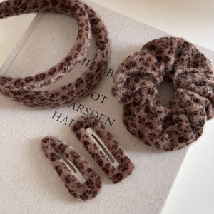 Brown leopard print plush hair accessory set with headband, scrunchie and hair clips