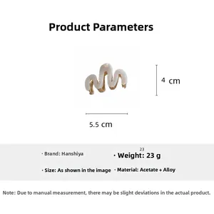 Vue détaillée montrant les dimensions de 5,5 cm de la pince à cheveux en acétate blanc