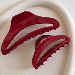 Set of two vintage deep red acetate shark hair claws with gold France Handmade lettering