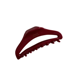 Hollow triangular burgundy acetate hair claw clip with golden logo and handmade finish
