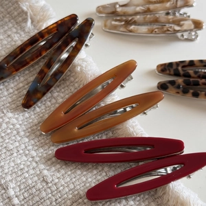 Barrettes à cheveux ovales en acétate avec motifs écaille de tortue et marbre