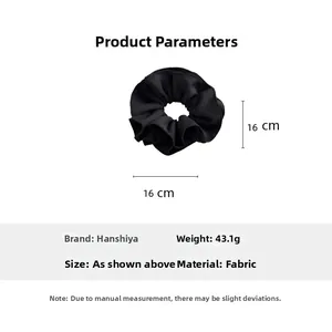 Detail of a large black fabric scrunchie with 16cm diameter and 43.1g weight display